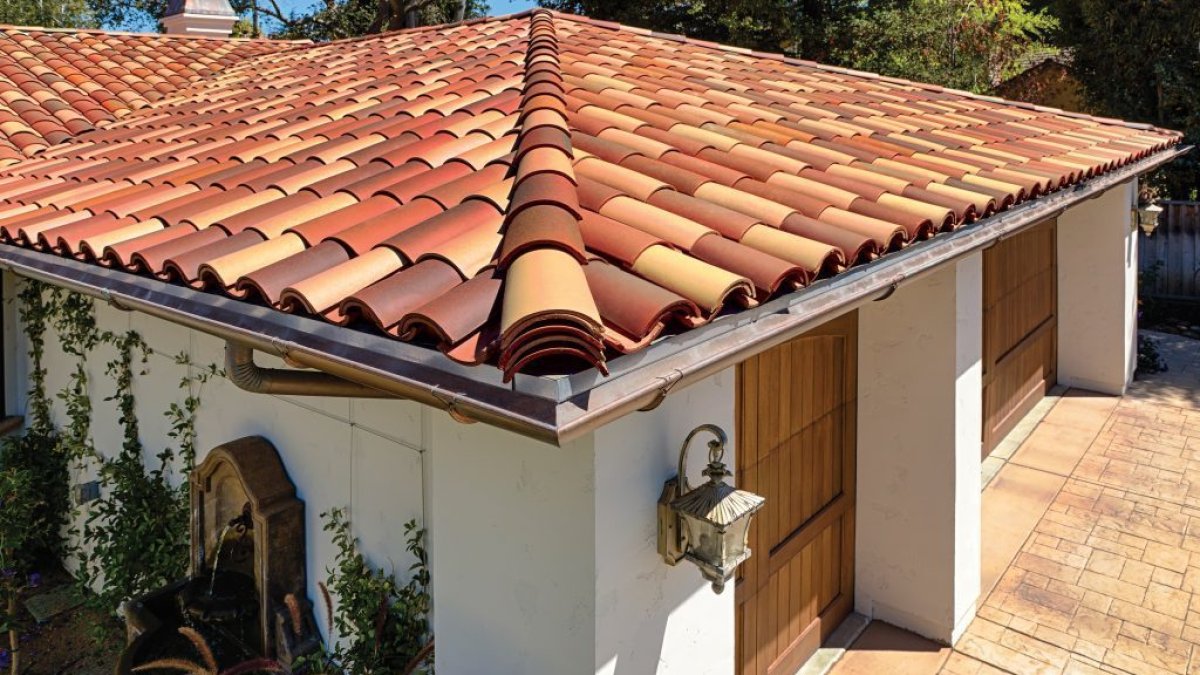 Spanish clay barrel tile roof in a terracotta blend